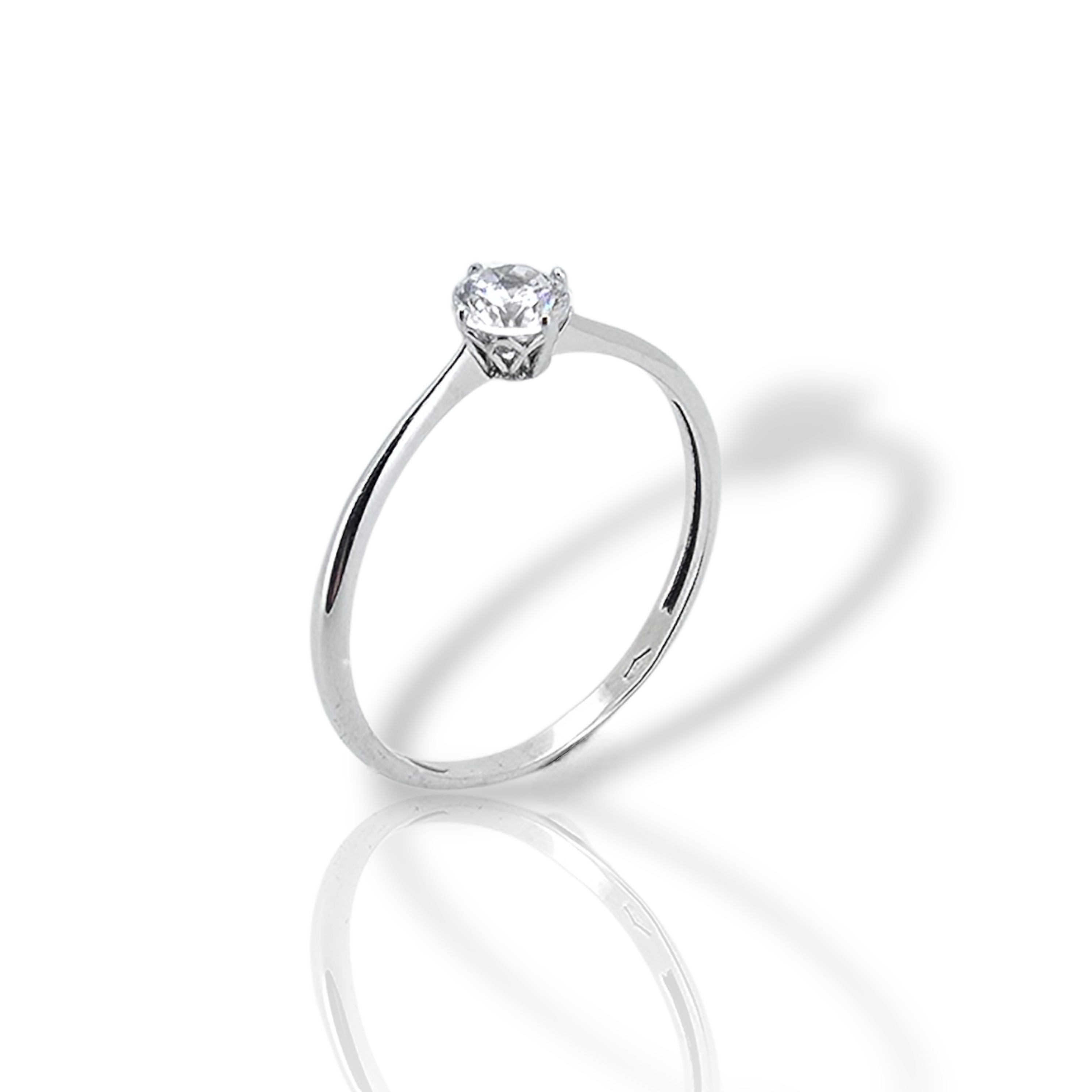 Δαχτυλίδι μονόπετρο απο λευκό χρυσό κ14 με ζιργκόν σε βάση με τέσσερα δόντια (code SM008256)