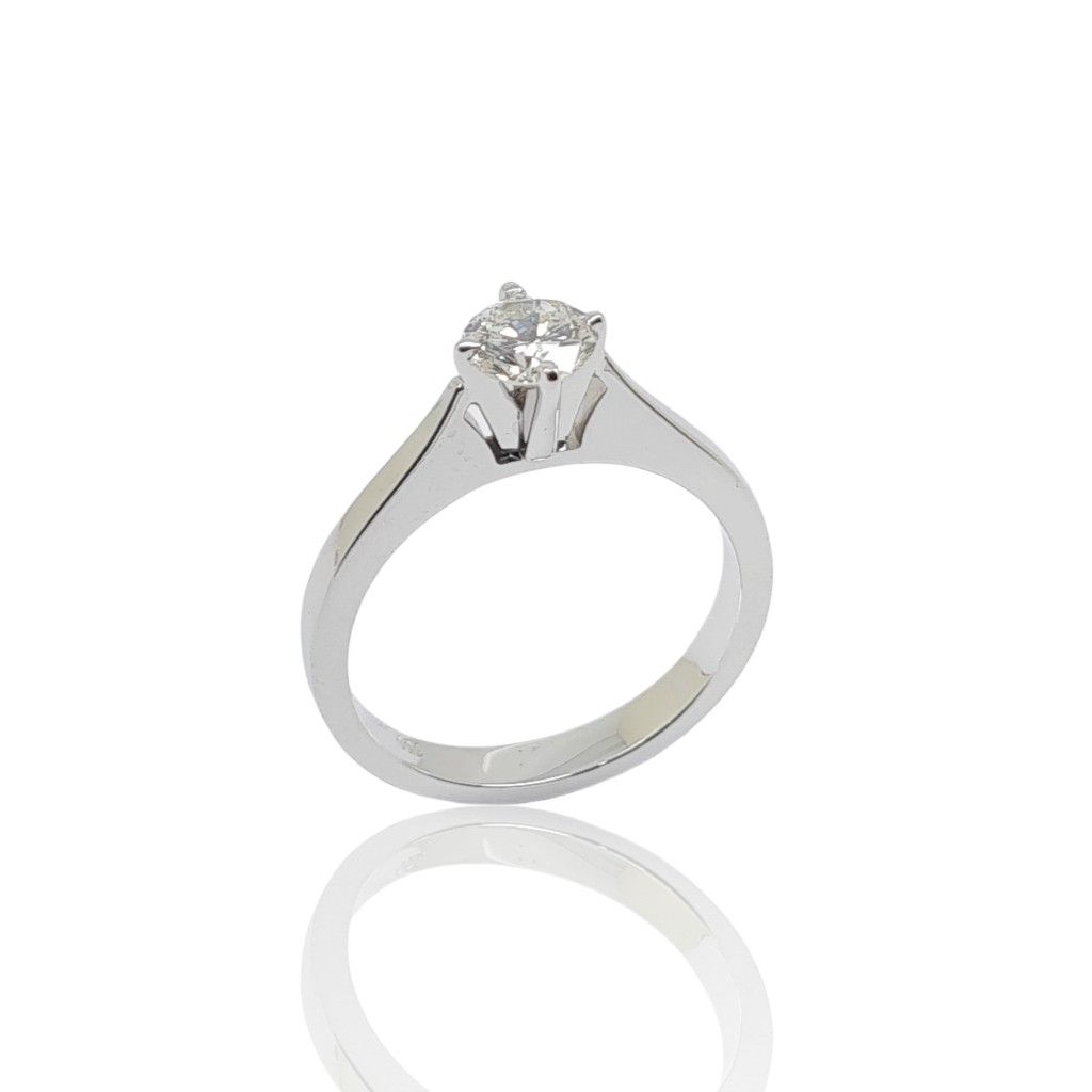 Μονόπετρο δαχτυλίδι απο λευκόχρυσο κ18 με διαμάντι δεμένο με καστόνι απο τέσσερα δόντια (code T2003)