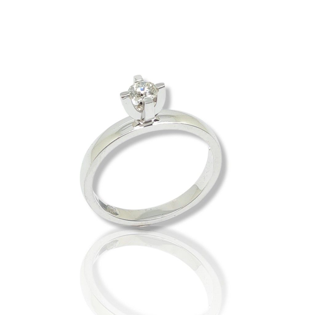 White gold single stone ring k18 with diamond nailed on four teeth bezel (code T2129)