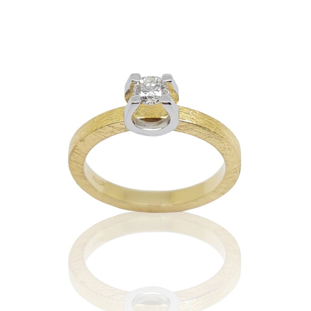 Golden single stone ring k18 with diamond tied on white gold k18 bezel (code P2028)