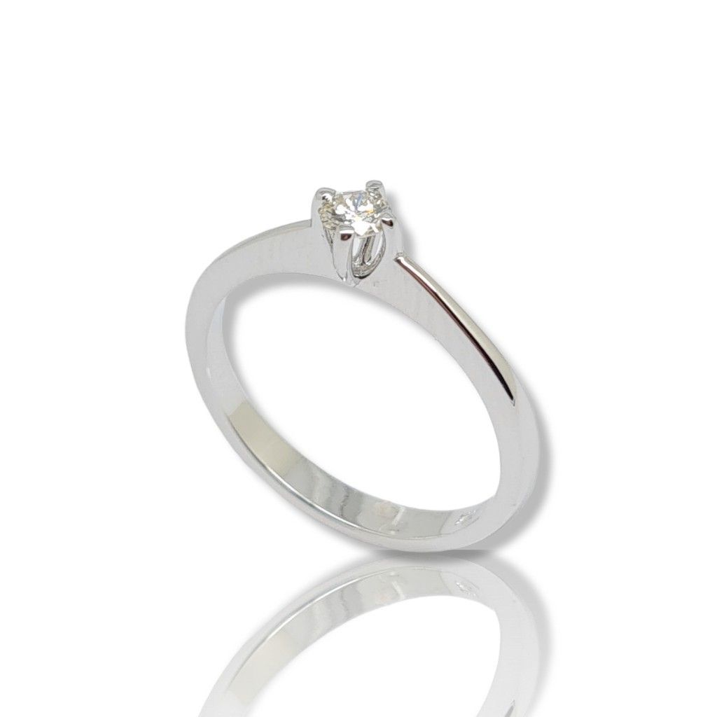 Μονόπετρο δαχτυλίδι απο λευκόχρυσο κ18 με διαμάντι καρφωμένο σε χωνευτό καστόνι (code T1896)