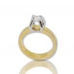 Golden single stone ring k18 with diamond on white gold bezel (code P2510)
