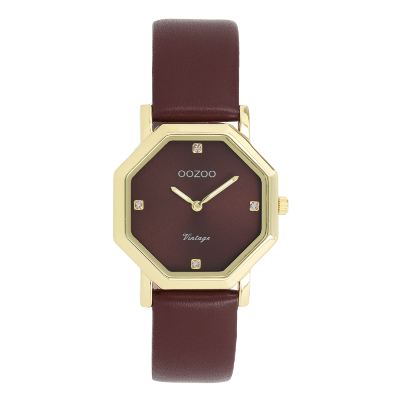 Φωτογραφία από Gold coloured OOZOO with bordeaux leather strap