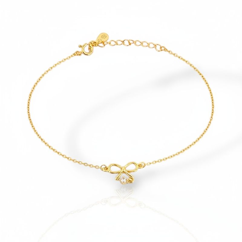 Φωτογραφία από Gold-Plated Bracelet with Zircon and Elegant Bow  (code FC011991)